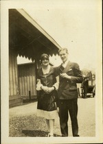 Man and woman smiling for camera