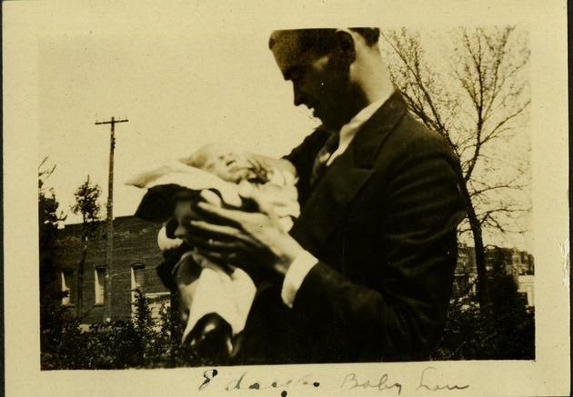 8 days baby Lou - Man holding baby
