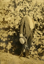 Man holding hat