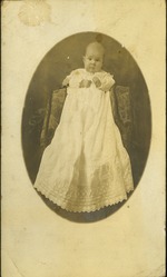 Baby in long dress, framed portrait