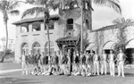 Jai Alai players stand in front of Coral Gables Country Club