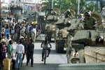 Tanks rolling down the street in Port-au-Prince
