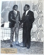 [1971-02-01] Bob Hayes and Harcourt Clark shake hands at the Bob Hayes Golf Tournament Trophy Ball