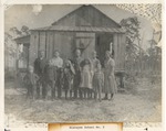 Sanstebo children and others posing outside Biscayne School No. 2