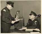 Police Officer with Desk Sgt. Al Hammond