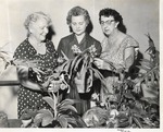 Garden Club Members holding plants