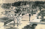Busy day at the marina, c. 1957