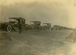 [1919/1921] Ward Miller with cars, c. 1920