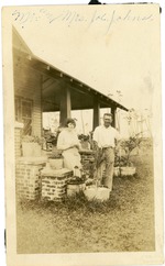 [1920/1929] Eva and Joe Johns standing outside their house