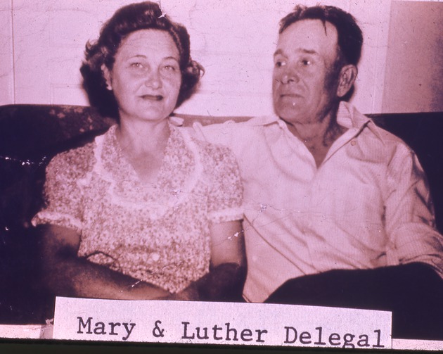 Mary and Luther Delegal on couch