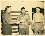 Three men, left to right, ? Brown, Boy Scout Executive; Russell Daniels, horse trader; Joe Lee Goodbread, mechanic