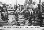 Group of people seated in a boat