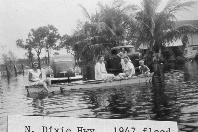People in boat on Dixie Highway