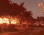 Color photo of house fire