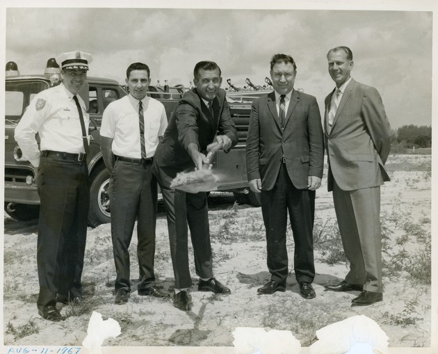 Five men at ground breaking