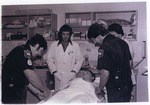 [1970/1979] Oakland Park Firemen with Dr. Lee in ER