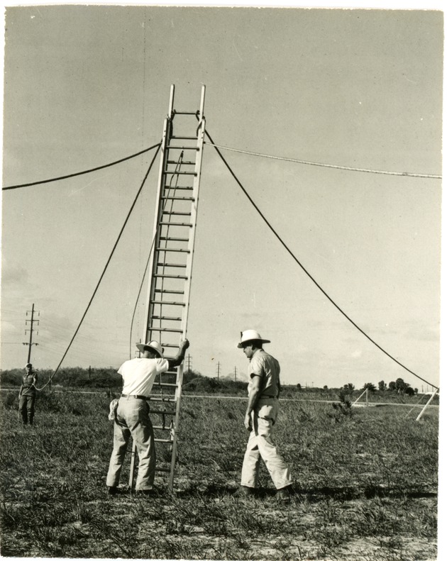 Two Oakland Park firemen practice climbing swaying ladder