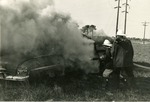 [1950/1959] Two Oakland Park firment with smoking car