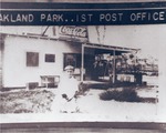 [1926] Oakland Park post office with boy posed outside
