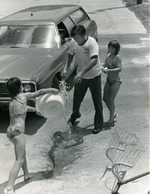 People at a Recreation Dept. car wash