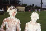 Two boys from whipped cream fight