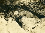 [1906] Charles Leon Pierce at mouth of cave, c. 1906