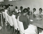 School children snacking with their teachers, c. 1965