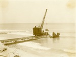 Large crane on north jetty of Boynton Inlet, 1925