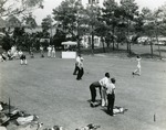 Golf game at country club, 1963