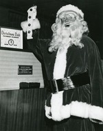 Guess who is playing Santa Claus? 1963