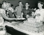 [1963-05-25] Serving cake at Boynton Beach's 46th birthday, 1963