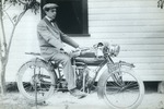 Principal Pfahl on his Indian motorcycle, c. 1914
