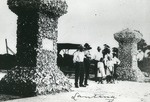 Carlson family at the Lantana pillars, c. 1920
