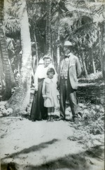 Family under the palms, c. 1905