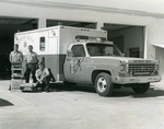 Fire rescue vehicle and crew, c. 1975