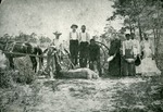 Pioneers with manatee, c. 1897