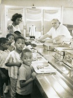Family at cafeteria, c. 1965