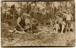 [1897] Group Picnicking on the Beach