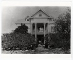 [1905] Brickell Family on Porch of Two-Story Home