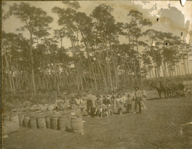 Crewmen and Their Children Posing For a Group Photo