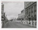 [1953] Members of a High School Band Parading on Flagler Street in Commemoration of Cuba Day