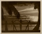 Silhouettes of Women Dancing on Beach