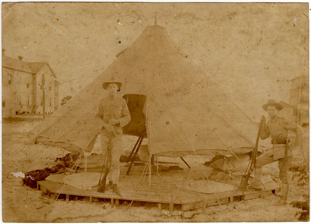 Soldiers in Front of Sleeping Tent
