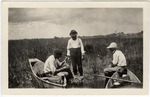 Three Men and Two Canoes in the Everglades