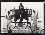 Three Men Pose with Deep Sea Fishing Catch, on a Dock
