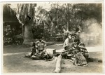 Seminoles Seated Around a Cooking Fire
