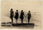 [1920-12-13] Four Women Standing in the Surf (Miami Beach, Fla.)
