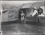 Airplane with Passengers Disembarking