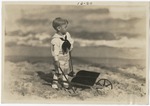 [1920-02-21] Boy Playing on the Beach