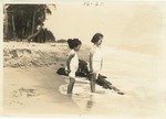 [1920-02-21] Two Girls Standing in the Surf (Miami Beach, Fla.)